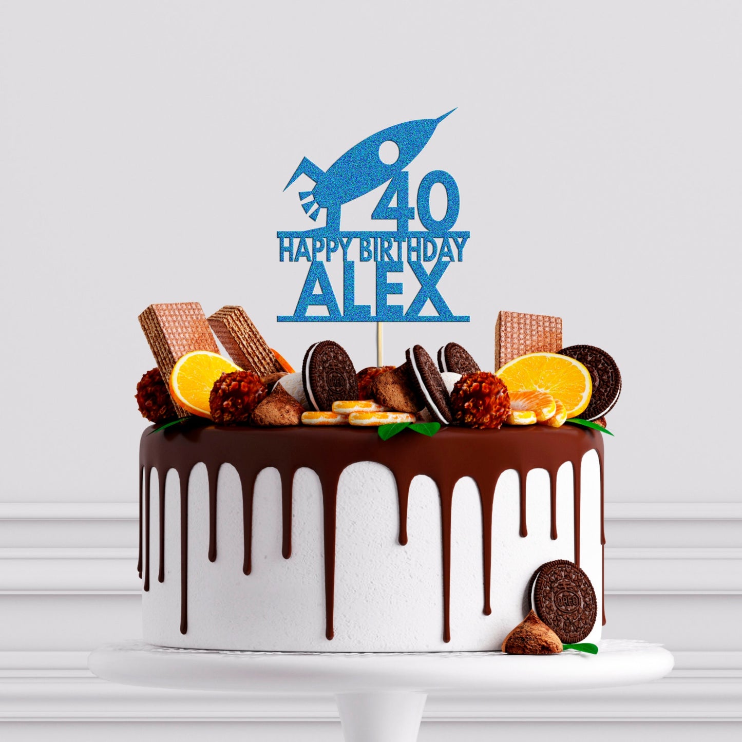 a birthday cake decorated with cookies and orange slices
