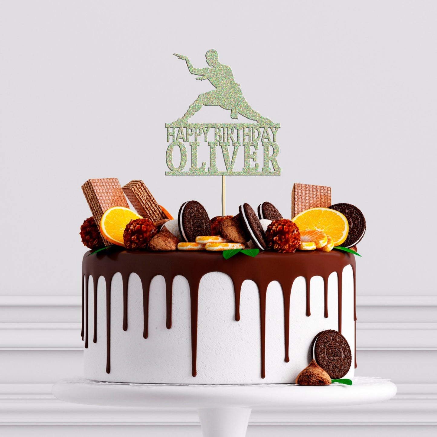 a birthday cake decorated with cookies and oranges