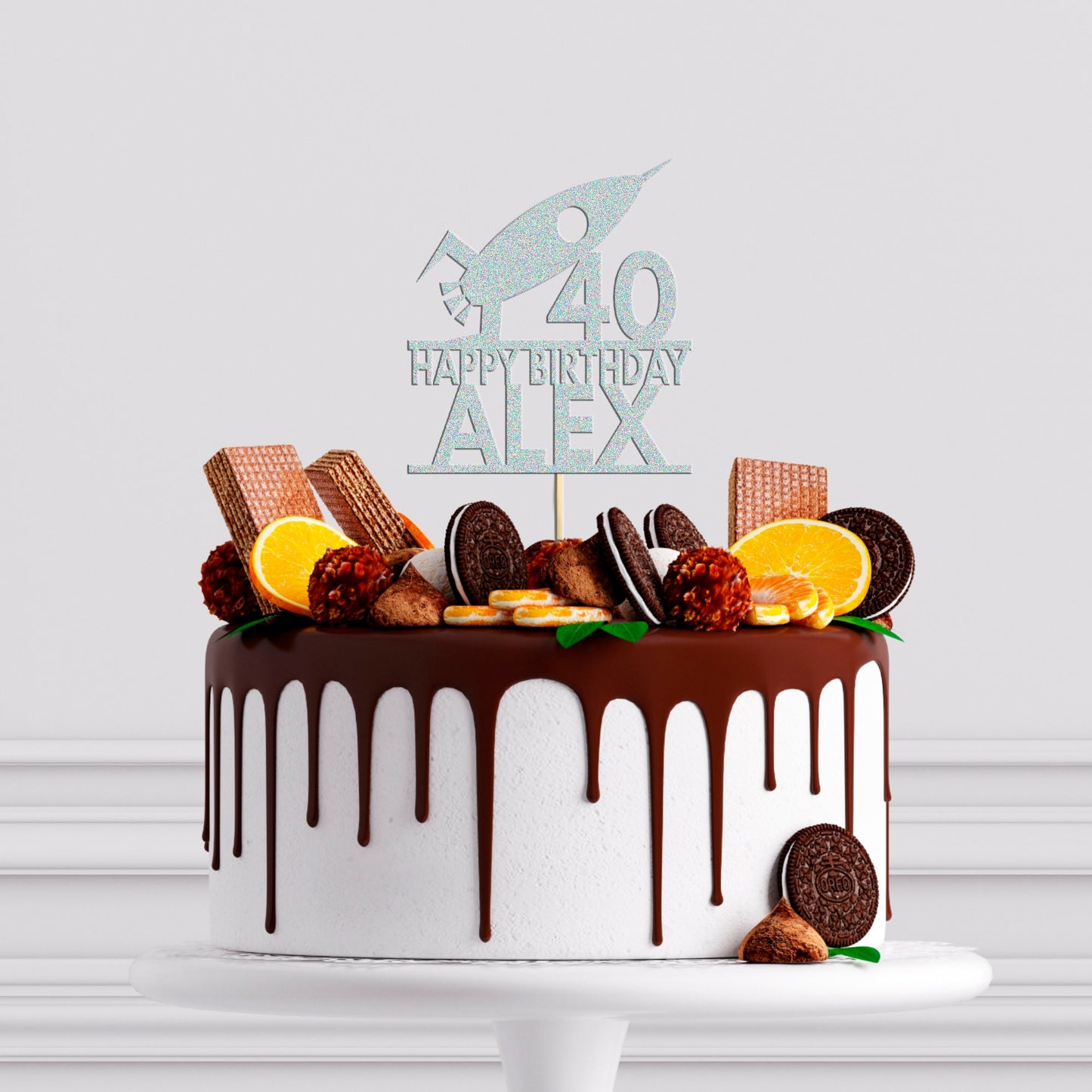 a birthday cake decorated with cookies and oranges