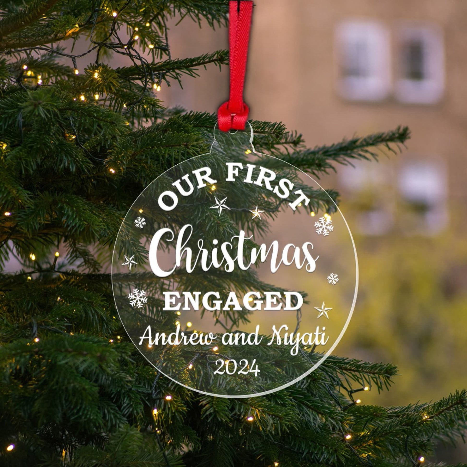 a christmas ornament hanging from a christmas tree