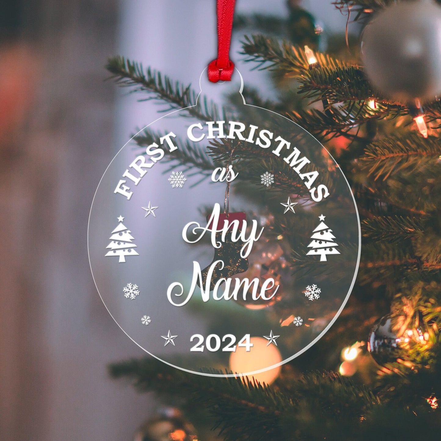 a glass ornament hanging from a christmas tree