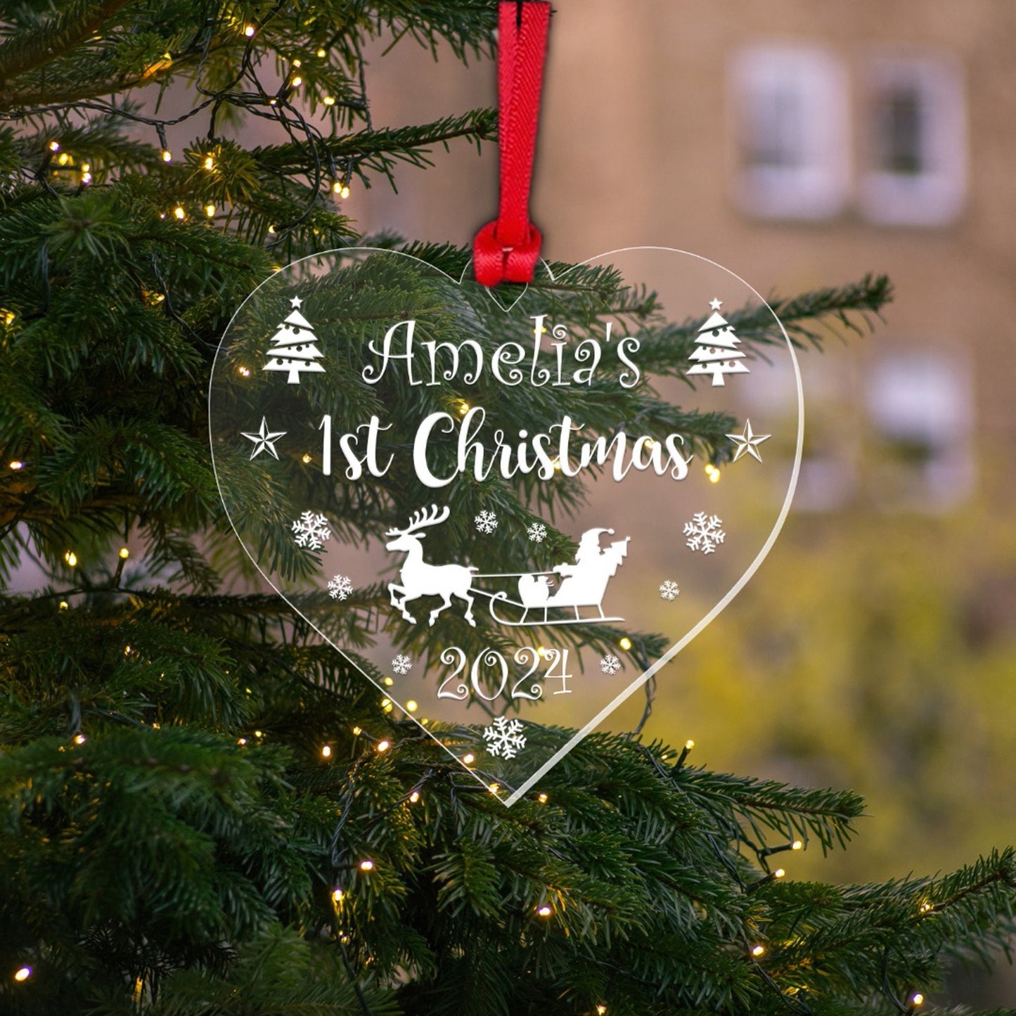 a christmas ornament hanging from a christmas tree
